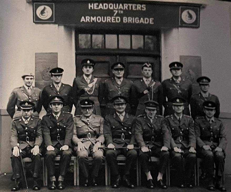 A group of men in uniform

Description automatically generated with low confidence