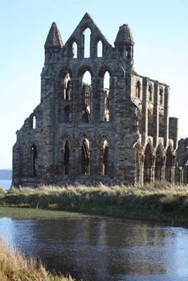 A stone building with arches

Description automatically generated with medium confidence