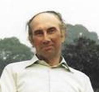 A close up of a mans face

Description automatically generated