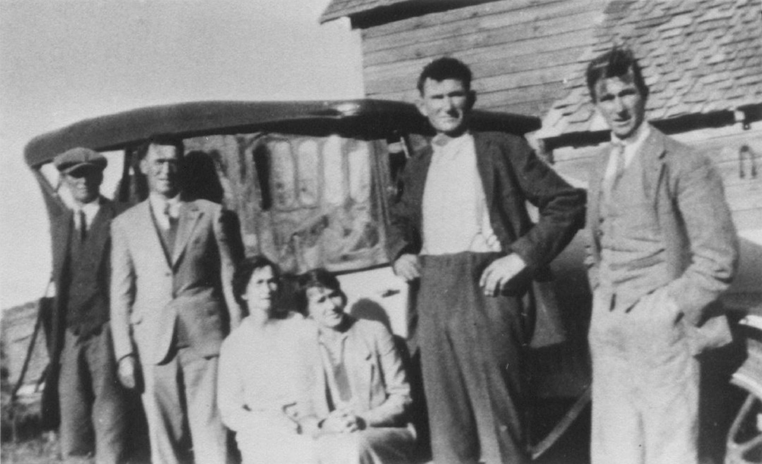 A group of people posing for a photo
Description automatically generated
