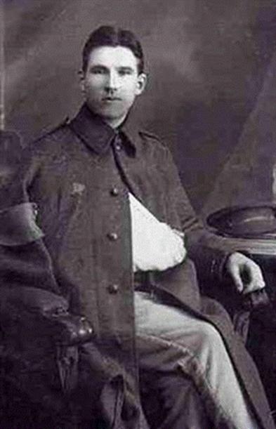 A person in a military uniform
Description automatically generated