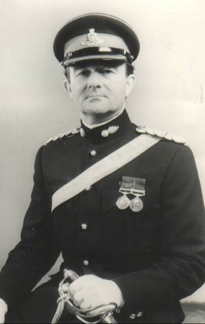 A person in a uniform
Description automatically generated with medium confidence