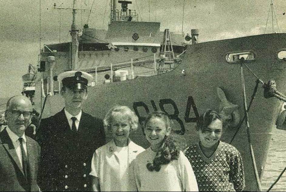 A group of people posing for a photo
Description automatically generated