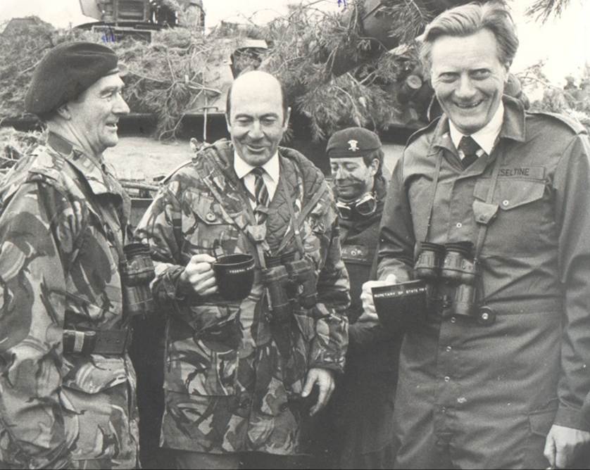 A group of men in military uniforms
Description automatically generated
