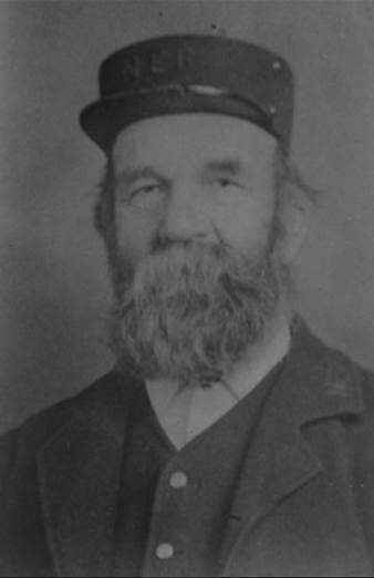 A person in a uniform
Description automatically generated