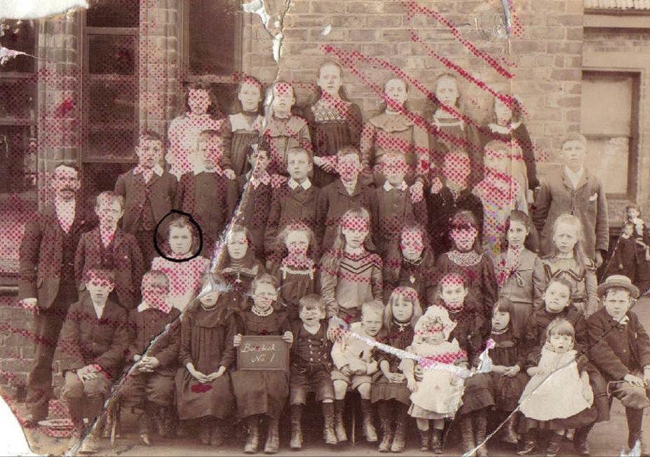 A group of children posing for a photo
Description automatically generated