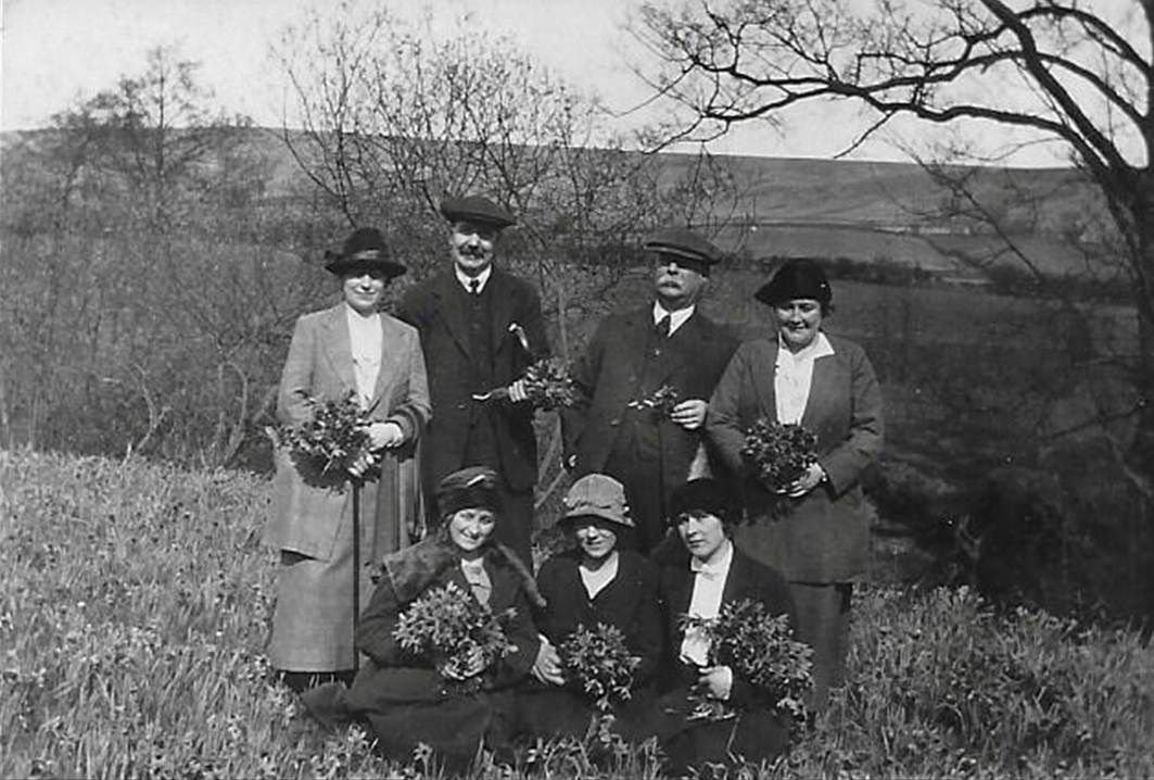 A black and white photo of a couple of people
Description automatically generated