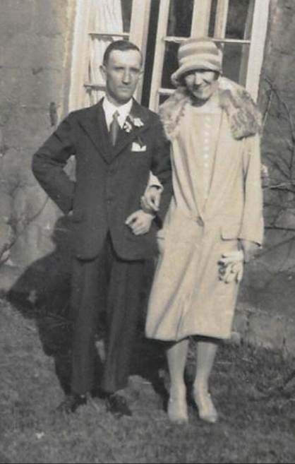 An old photo of a person
Description automatically generated
