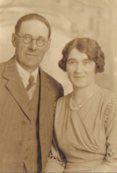 A person and person posing for a photo
Description automatically generated