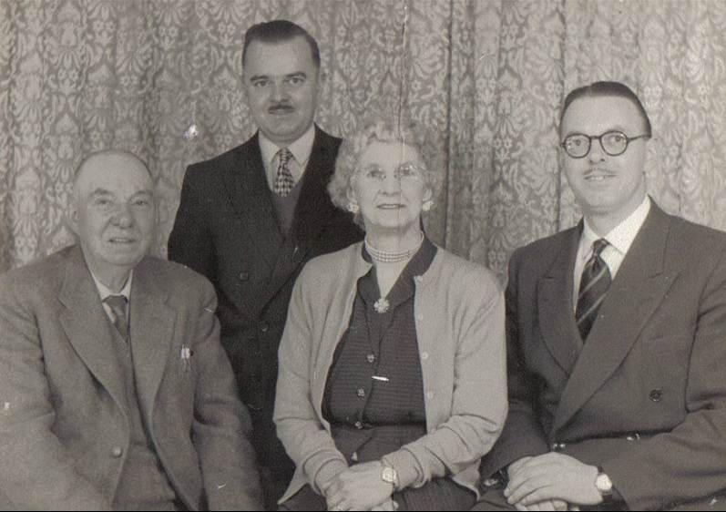 A group of people posing for a photo
Description automatically generated