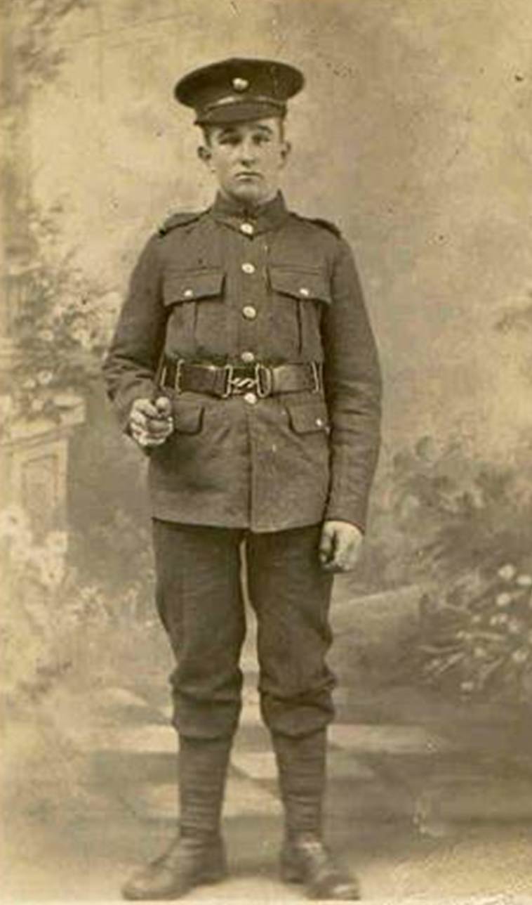 A person in a uniform

Description automatically generated with medium confidence