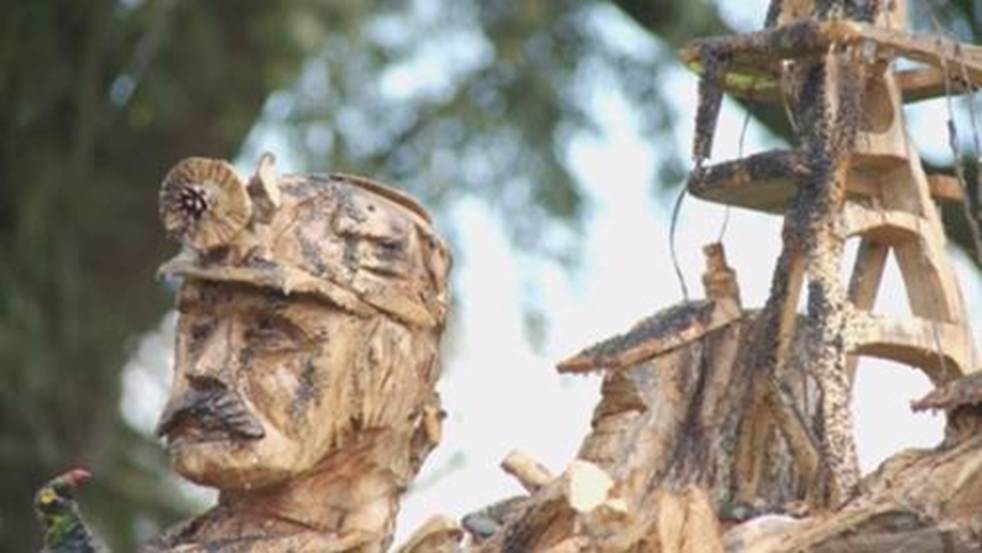 A close-up of a wood carving

AI-generated content may be incorrect.