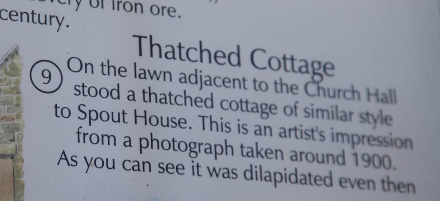 A close-up of a sign

Description automatically generated