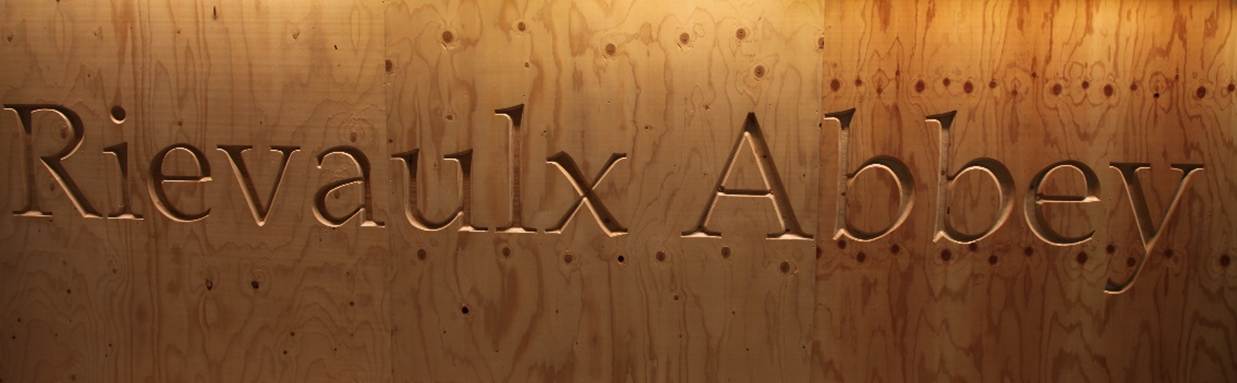 A close-up of a carved wood wall

AI-generated content may be incorrect.