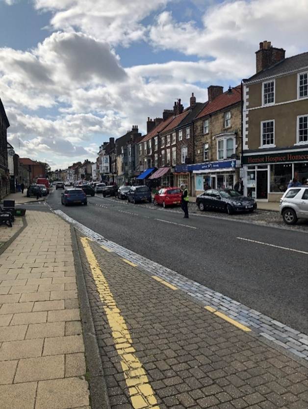 A close up of a street
Description automatically generated